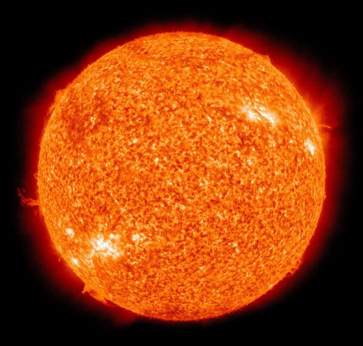 The Sun in extreme ultraviolet, its corona glowing above the surface